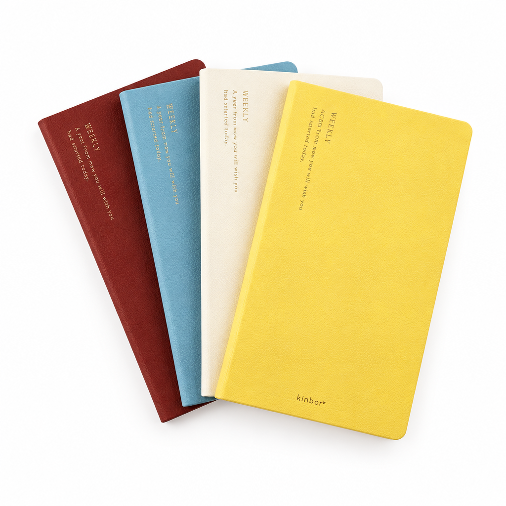 Cuatro colores de planner Kinbor en abanico